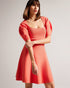HAYLIY-Dresses-Feminine, flattering and a wardrobe staple, HAYLIY is ideal for day-to-night dressing. Cut with short puff sleeves, a square neckline and a zip fastening, this dress will be your go-to piece for bar-hopping and date nights.This product is made using FSC ® Viscose fibres. The fabric of this product is partly made of a more sustainable viscose fibre, which comes from responsibly managed forests. Skater dress Short puff sleeves Square neck Zip fastening Elasticated waistband Julia is 5'10" / 1.7